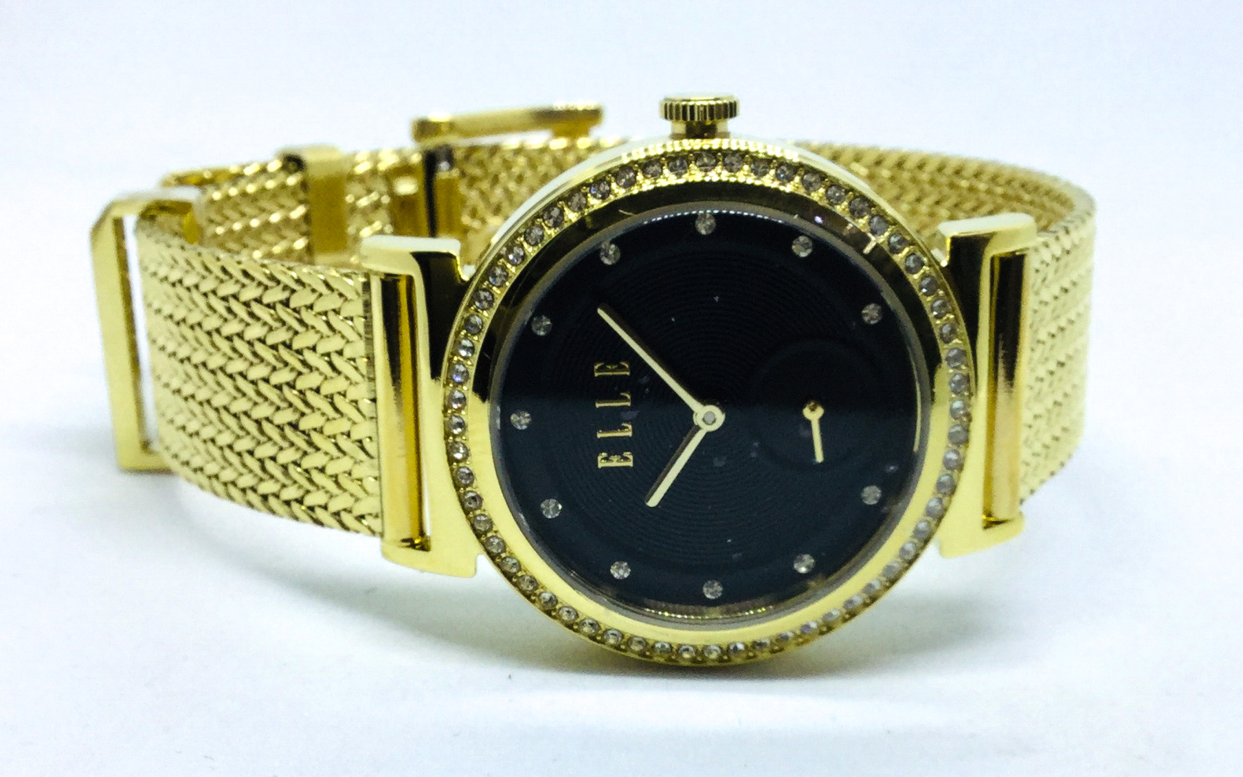 Montre femme, stainless, bracelet mèche, cadran entouré de pierres