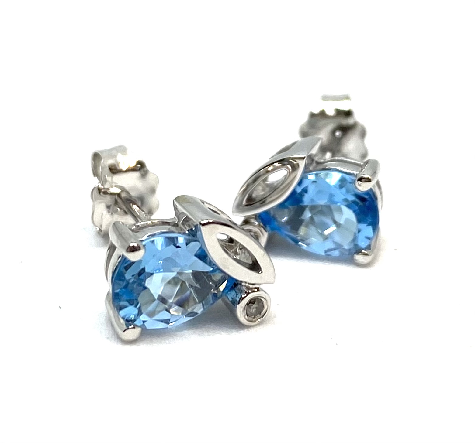 Boucles d'oreilles pour femme en or 10K, 2 diamants pour 0.01 carat, 2 topazs bleus 7x5mm coupe poire