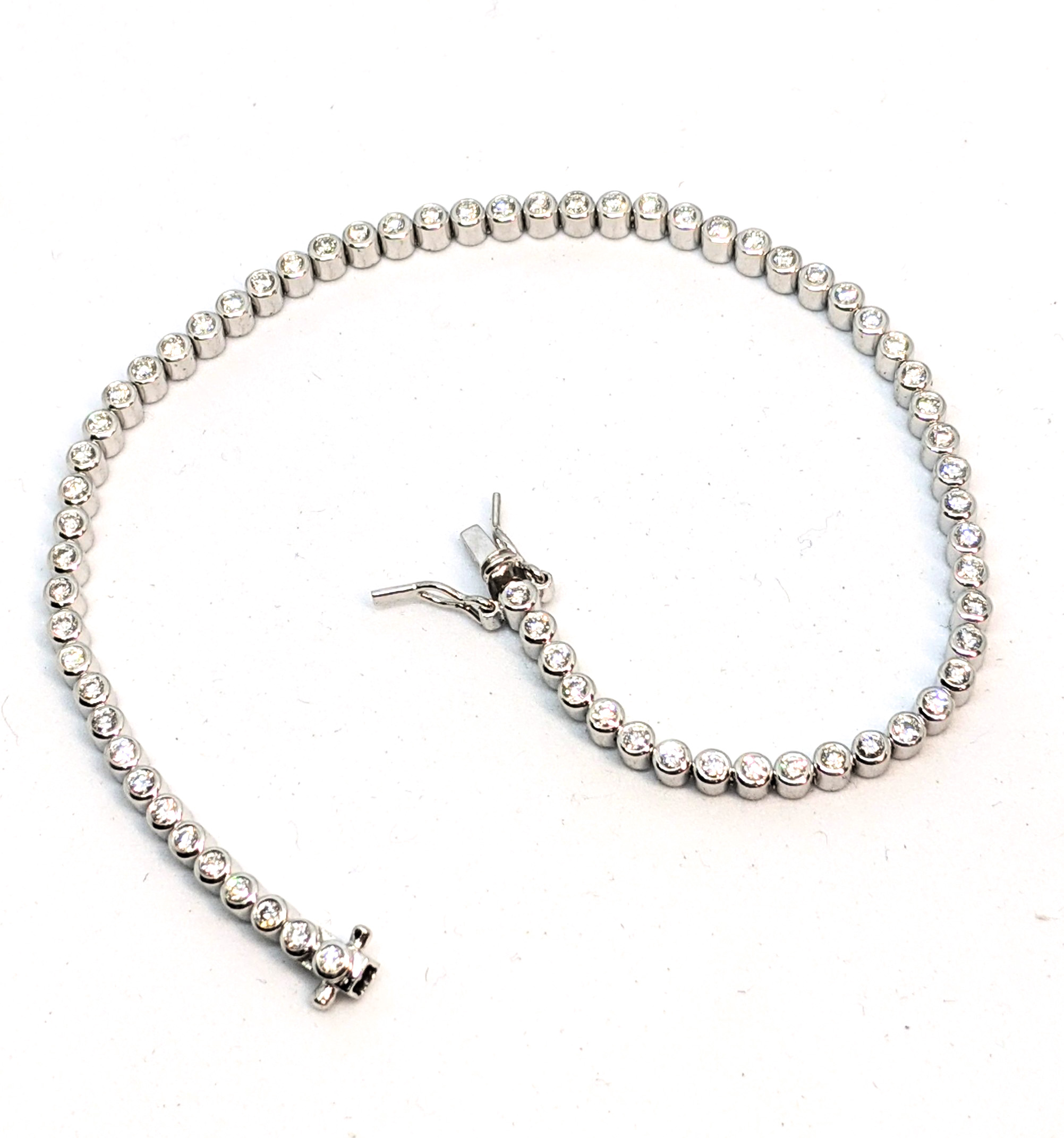 Bracelet tennis or 14K, 68 diamants pour 1.3ct (130 points) total