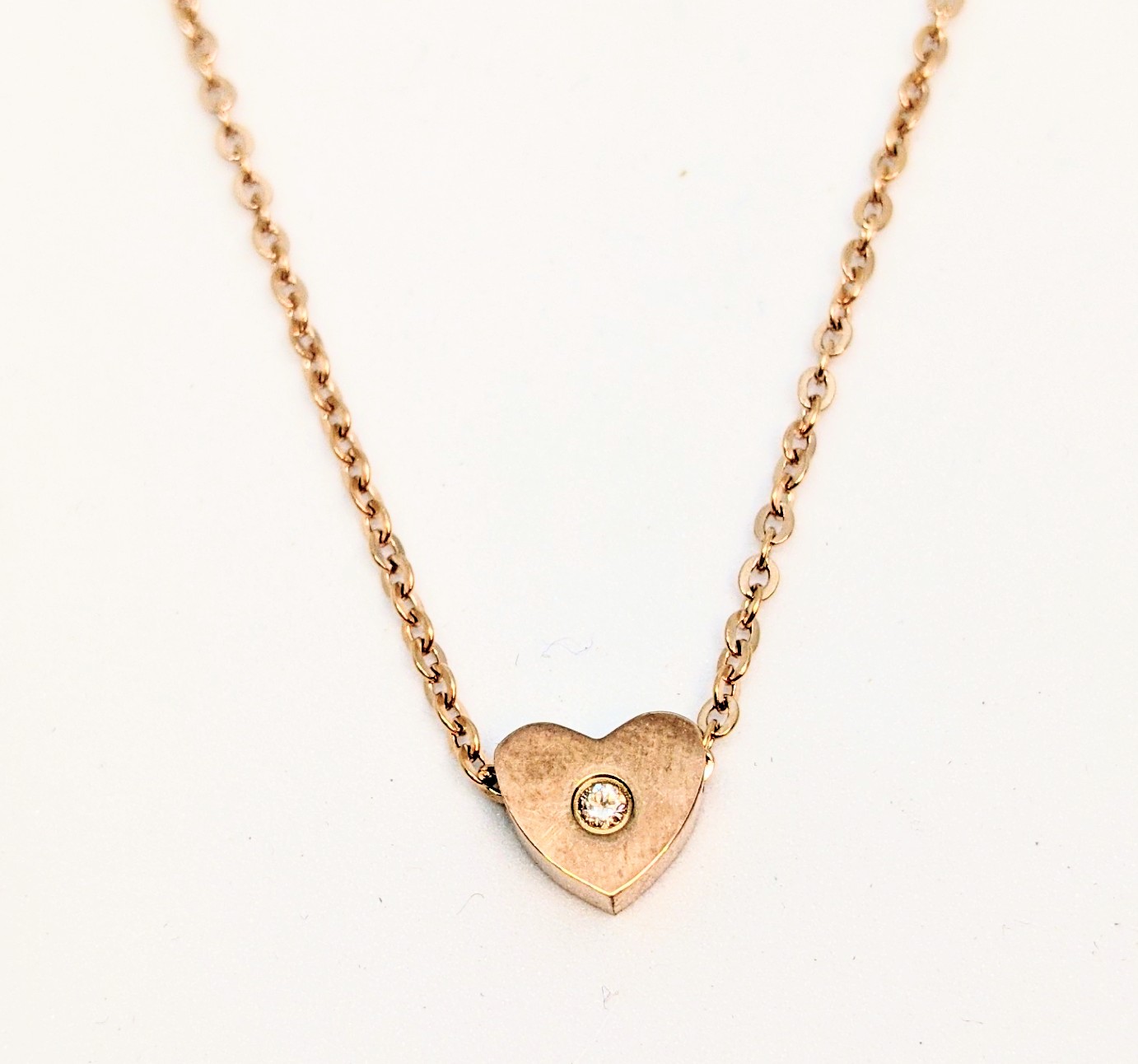 Pendentif stainless, coeur avec 1 pierre dans le centre